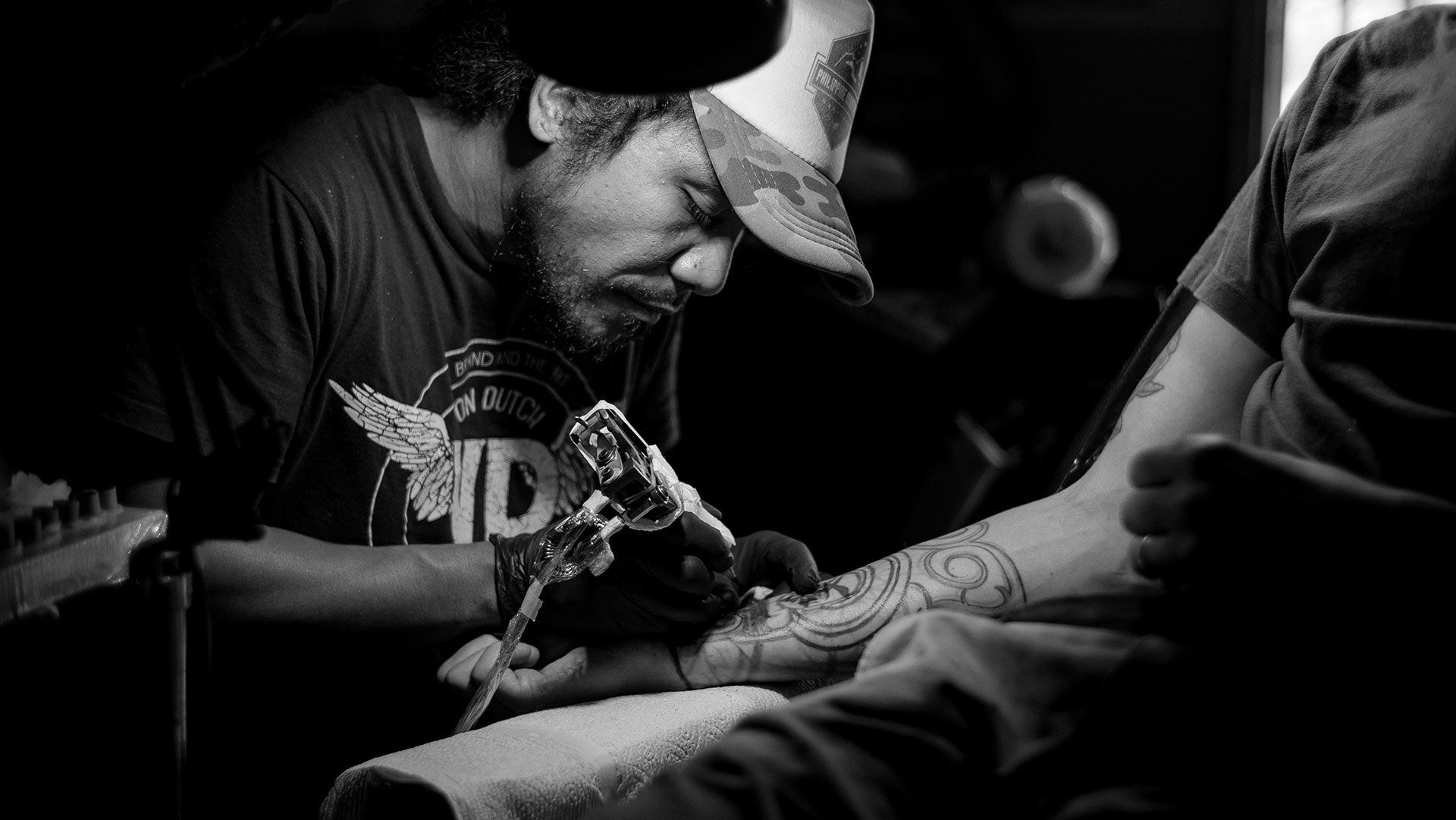 tattoo artist at work